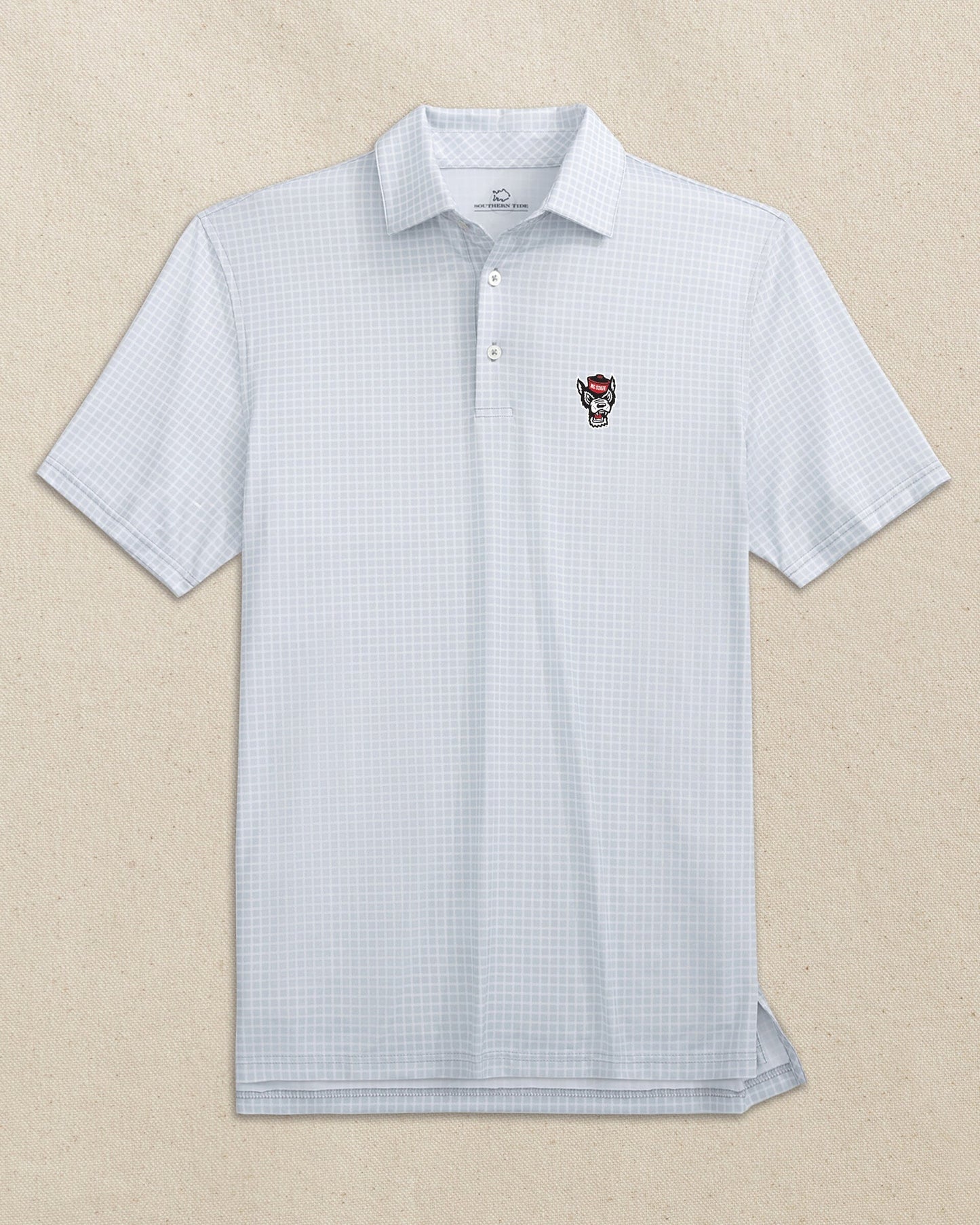 The front view of the Southern Tide NC State Wolf Head Driver Dunes Edge Plaid Polo by Southern Tide - Slate Grey