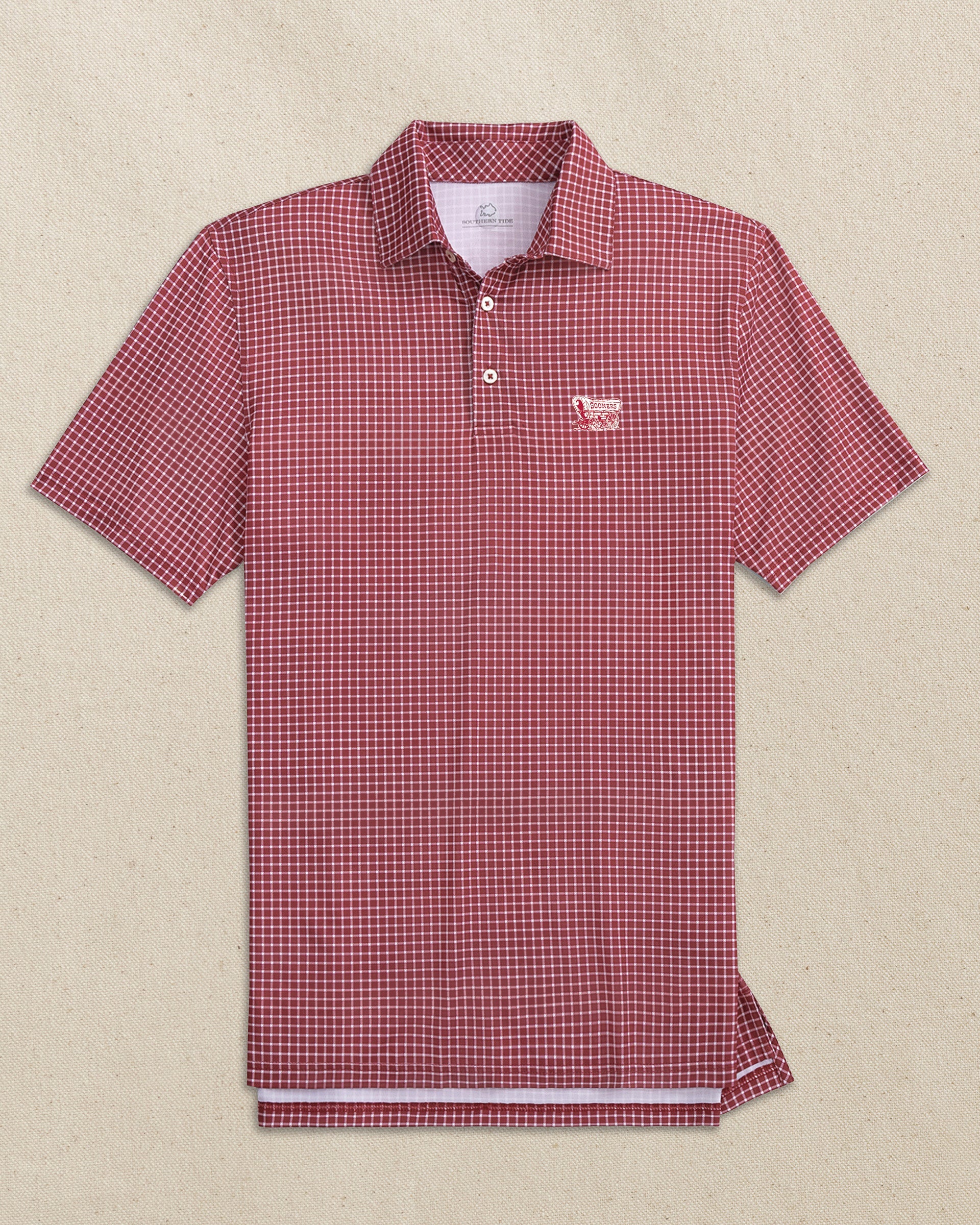 The front view of the Southern Tide Oklahoma Sooner Schooner Driver Dunes Edge Plaid Polo by Southern Tide - Crimson